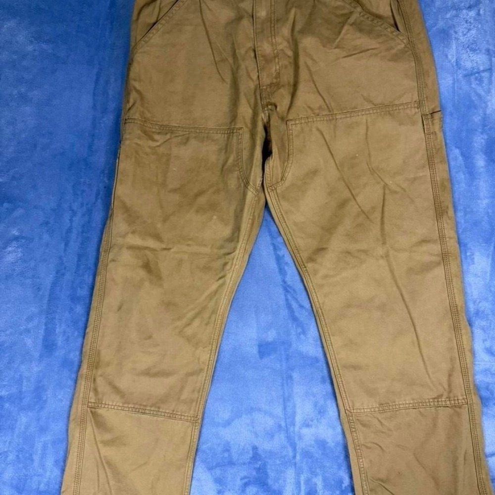 Levi's Tan cargo pants with adjustable waist and pockets. Size: w38 L32